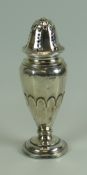 A SILVER SUGAR CASTER of floral form raised on a circular base, Birmingham 1919, 5.4oz gross