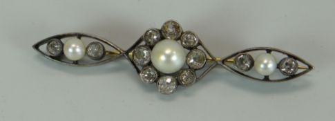 A VICTORIAN CUT DIAMOND & PEARL BROOCH propeller-shaped and set in yellow and white gold and