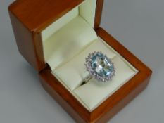 A MODERN SILVER, AQUAMARINE & DIAMOND RING