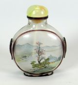 A CHINESE INSIDE-PAINTED GLASS SNUFF BOTTLE in moon-flask form with stopper, 7.5cms high