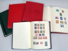 FIVE STAMP ALBUMS comprising red 'Popular Album' with sparsely populated world stamps, blue album