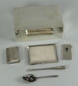 A SILVER CIGARETTE BOX & RELATED CONTENTS including a silver cheroot holder, machine turned silver