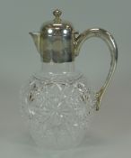 A SILVER & CUT-GLASS CLARET-JUG with hinging lid and silver handle, Sheffield 1897, James Dixon &