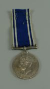 A GEORGE VI POLICE SERVICE MEDAL For Exemplary Service to SERGT JOHN W E GRIFFITHS