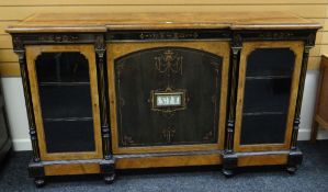 A FINE QUALITY VICTORIAN BREAKFRONT CREDENZA in ebony walnut and other wood composed of a centre