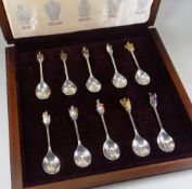 A CASED SET OF TWELVE ELIZABETH II SILVER HERALDIC SPOONS entitled 'The Queen's Beasts Collection'