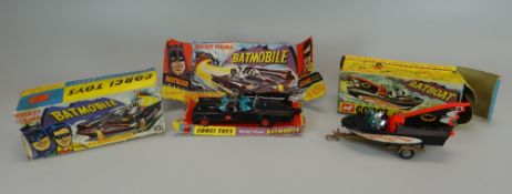A BOXED CORGI TOY BAT MOBILE with Batman & Robin together with a Bat Boat