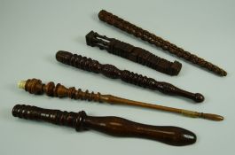 FIVE CARVED 18TH/19TH CENTURY KNITTING STICKS of various forms, styles and wood, the longest,