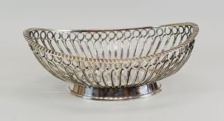 A WMF SILVER PLATE BASKET of oval openwork form, bears WMF mark for exports of France circa 1909-