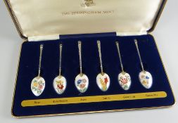 A CASED SET OF ENAMEL SPOONS by the Birmingham Mint, with certificate, each spoon enamelled with