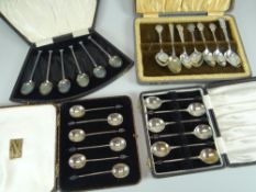 A PARCEL OF SILVER CUTLERY comprising three cased sets of six silver coffee spoons and a cased