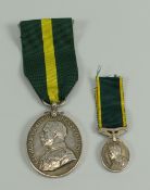 A GEORGE V TERRITORIAL EFFICIENCY MEDAL named to 464 Cpl D POWELL 2/WELSH BRFA together with