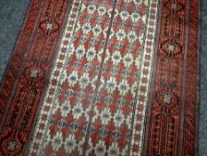 AN OILD AFGHAN BLOUCH TRIBAL RUG 181 x 94cms