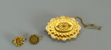 A VICTORIAN 15CT YELLOW GOLD OVAL LOCKET BROOCH & EARRING SET with 'Dorothy's first hair'