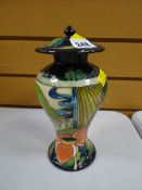 Modern Moorcroft tube lined floral lidded vase, initialled and dated 2006