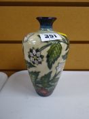 Modern Moorcroft tube lined small floral vase in the 'Fruit Garden' pattern, signed with initials