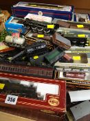 Collection of various boxed and unboxed model railway items including Airfix, Bachmann carriages,