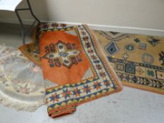 A large modern patterned rug together with an Oriental wool pile rug & a Chinese washed hearth rug
