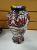 Modern Moorcroft tube lined floral vase of baluster form, signed with initials 'D S' and dated 2002