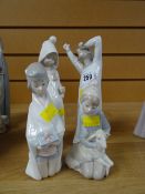 Three Lladro nightgowned children and another