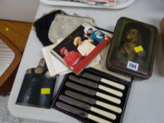 Vintage Cadbury chocolate tin with dog decoration to the lid, a hip flask, cased tea knives and