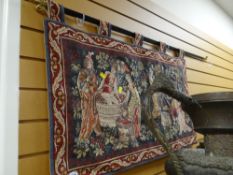 Medieval style tapestry on a fleur-de-lys hanger