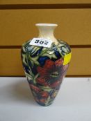 Modern Moorcroft tube lined small floral vase, signed with initials 'W M' and dated 2000
