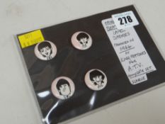 Four 1964 The Beatles lapel badges produced by King Features for ATV