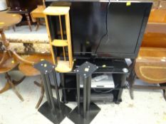 Panasonic Viera flatscreeen TV on stand with equipment