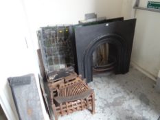 Quantity of fireplace metalware, dog grate, fire surround etc