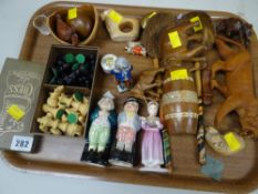 Tray of collectables including carved items, chess pieces, pottery figures, brass snuff box etc