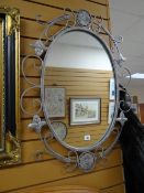 Metallic floral framed oval mirror