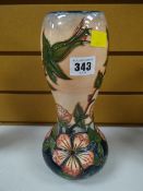 Modern Moorcroft tube lined floral vase of gourd shape, signed with initials and dated 1997