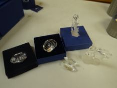 Five boxed and unboxed Swarovski crystal glass sea related items