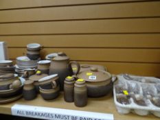 Quantity of Denby stoneware dinnerware including cutlery