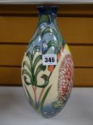 Modern Moorcroft tube lined floral vase with a narrow neck, being a trial piece 2007