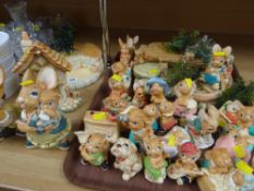 Large collection of Pendelfin figures with stands