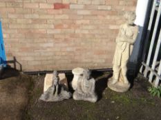 Large Pandora garden statue together with a Buddha and other stone items (outside)