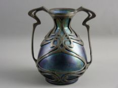 A ZSOLNAY IRIDESCENT POTTERY VASE WITH PEWTER MOUNTS, the bulbous form vase in green and purple