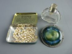 A LARGE CIRCULAR RUSKIN TYPE BROOCH in a beaten pewter mount, 6.5 cms overall diameter, a cultured