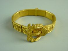 A PINCHBECK SCROLL PATTERNED TABLET BRACELET with buckle fastening, 30 grms