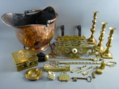 A GOOD COPPER HELMET COAL SCUTTLE with swing handle and a parcel of brass candlesticks and minor