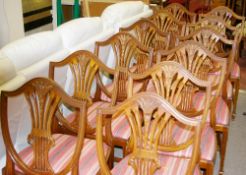 A SET OF TWELVE HEPPLEWHITE STYLE SPLAT & WHEATSHEAF BACKED MAHOGANY DINING CHAIRS with domed