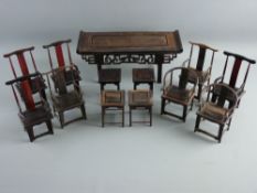 A SUITE OF CHINESE MINIATURE HARDWOOD FURNITURE to include an altar table with pierced fretwork