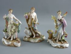 THREE GERMAN PORCELAIN CLASSICAL STYLE FIGURES bearing flowers, fruit, horns of plenty etc on