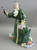 A ROYAL DOULTON FIGURINE - 'Christmas Parcels' HN2851