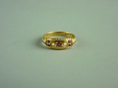AN EIGHTEEN CARAT GOLD RUBY & SEED PEARL DRESS RING, 2.9 grms, size 'M'