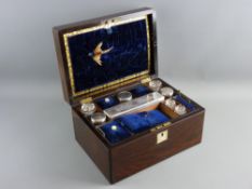 A VICTORIAN ROSEWOOD TRAVELLING VANITY CASE with inset top mother of pearl plaque and escutcheon,