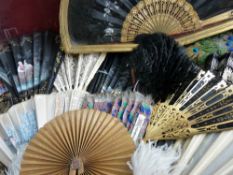 A COLLECTION OF SIXTEEN ANTIQUE & LATER FANS and three gilt wood display cases, various materials