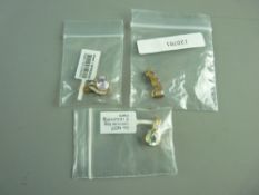 A NINE CARAT GOLD BLUE PEAR SHAPED QUARTZ & TINY DIAMOND PENDANT, 2.5 grms gross, a nine carat